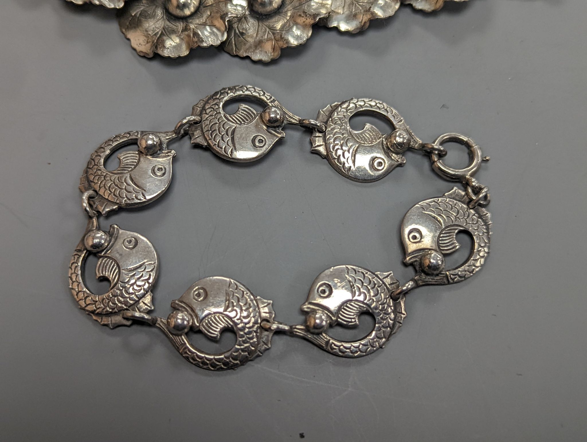 A Danecraft sterling flower head link necklace, 42cm and a Danish sterling fish link bracelet.